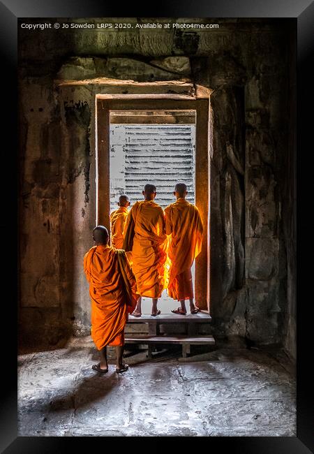 Buddhist Monks at Angkor Wat Framed Print by Jo Sowden