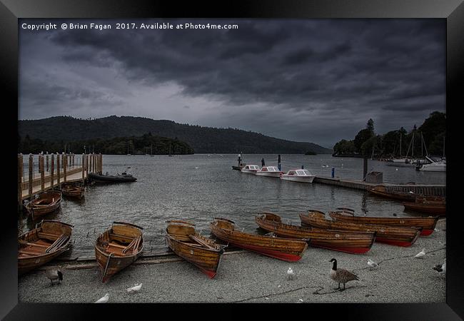 Dark Clouds over windermere Framed Print by Brian Fagan