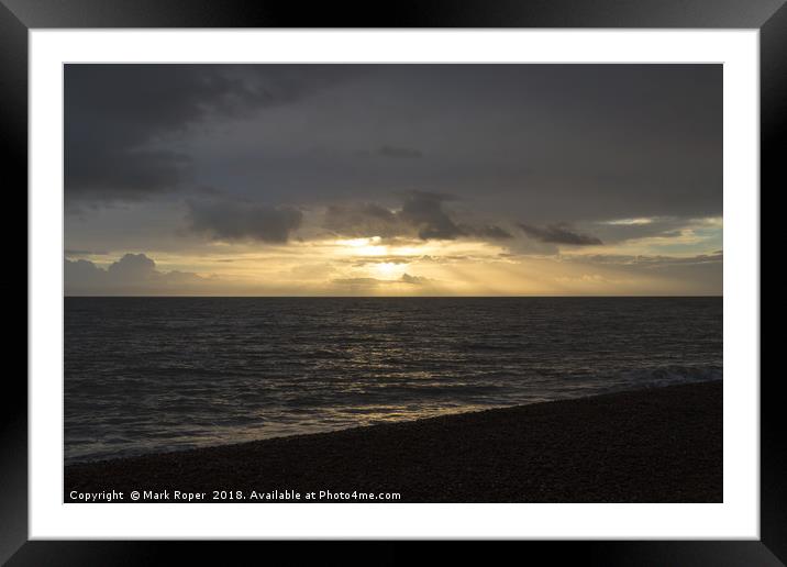 Morning sunrise with sun rays shining through clou Framed Mounted Print by Mark Roper