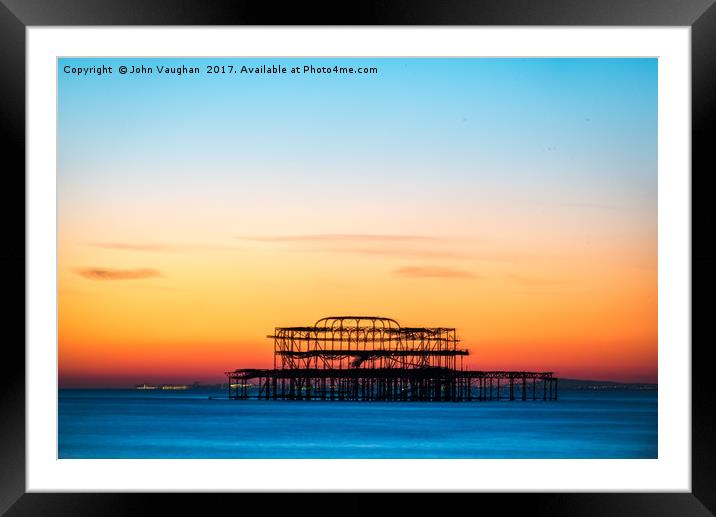 Sunset over West Pier Framed Mounted Print by John Vaughan