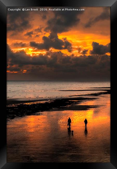 Sunset walkers on Worthing Beach Framed Print by Len Brook