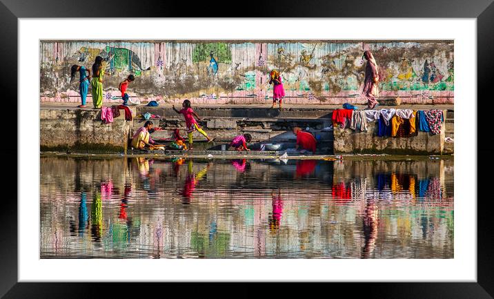Indian family washing in lake Framed Mounted Print by tim miller