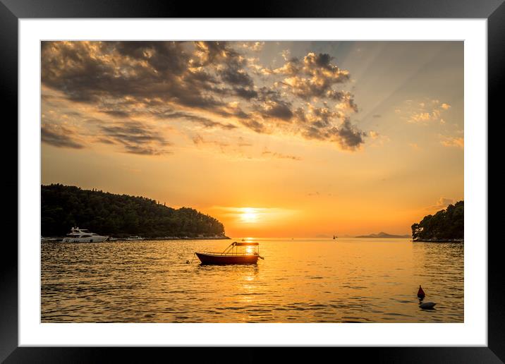 Drifting boat as sun sets  Framed Mounted Print by Naylor's Photography