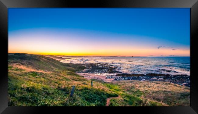 The raw beauty of Bamburgh Framed Print by Naylor's Photography