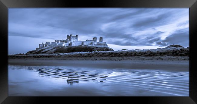 Bamburgh Castle in Blue Framed Print by Naylor's Photography