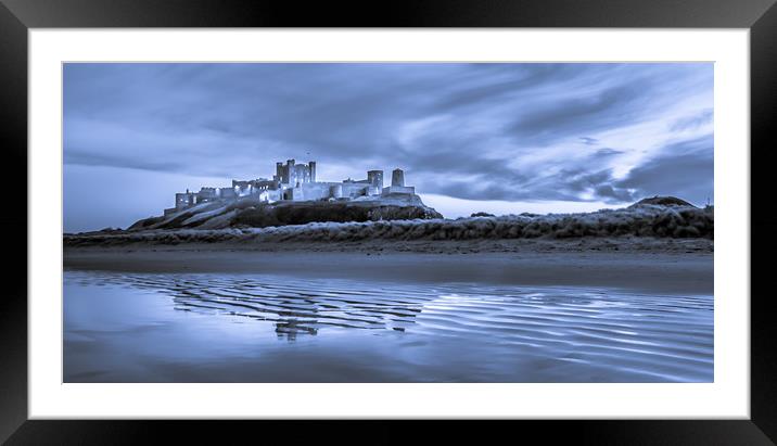 Bamburgh Castle in Blue Framed Mounted Print by Naylor's Photography