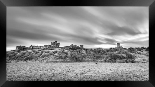 The Magnificent Bamburgh Castle in Mono Framed Print by Naylor's Photography
