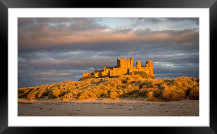 Bamburgh Castle from the beach at Easter Framed Mounted Print by Naylor's Photography