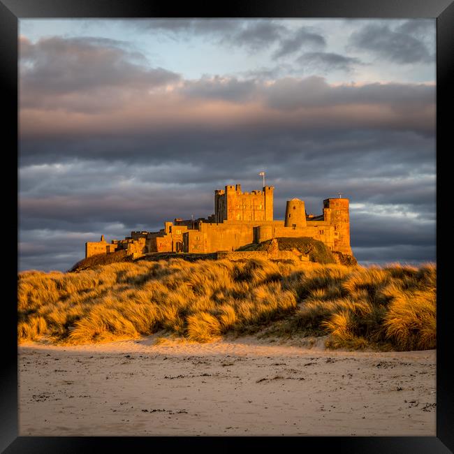 Sunset at Bamburgh Castle Framed Print by Naylor's Photography