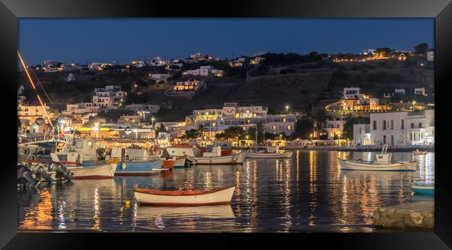 Fishing boats at night in Mykonos town Framed Print by Naylor's Photography