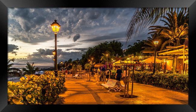 Costa Adeje seafront evening strolls Framed Print by Naylor's Photography