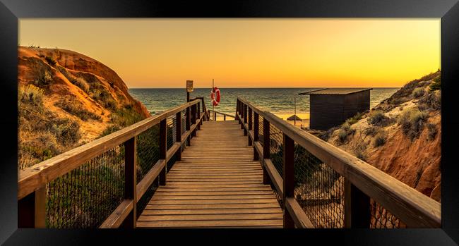 Sunset boardwalk to Praia da Falesia beach Framed Print by Naylor's Photography