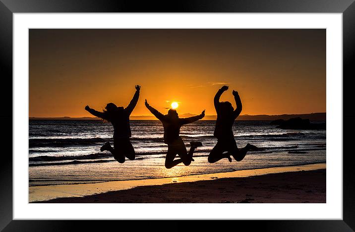  Jumping for joy ,on Druidstone beach. Framed Mounted Print by Philip Jones