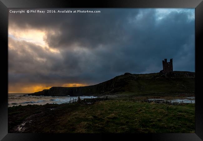 Sunrise at Dunstanburgh Framed Print by Phil Reay