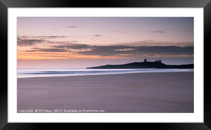 Dunstanburgh Castle at sunrise Framed Mounted Print by Phil Reay