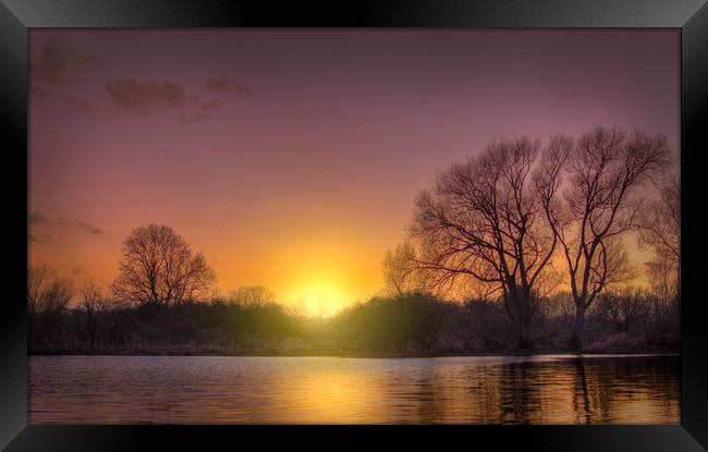Sunset over water. Framed Print by John Allsop
