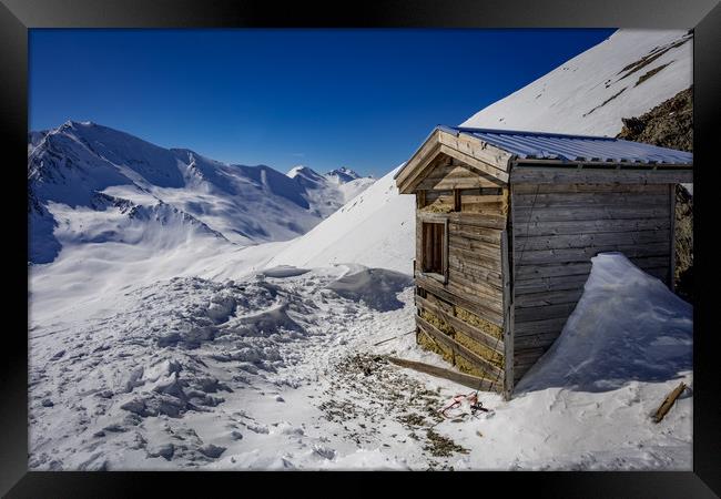 Mountain Shack Framed Print by David Schofield