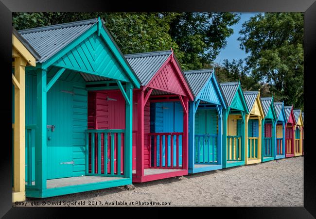 Beach Huts Llanbedrog Framed Print by David Schofield