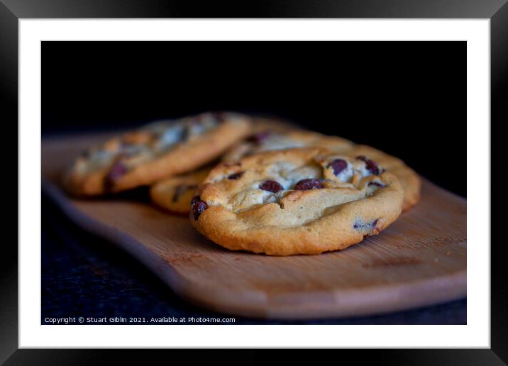 Freshly baked chocolate chip cookies Framed Mounted Print by Stuart Giblin