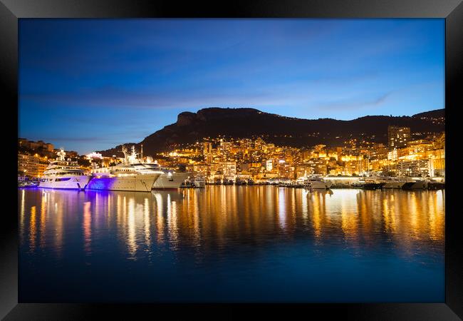Monaco at Twilight Framed Print by Artur Bogacki