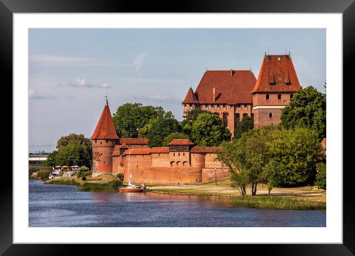 Malbork Castle at Nogat River in Poland Framed Mounted Print by Artur Bogacki