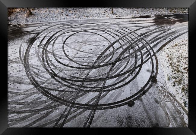 Car Drift Skid Marks In Winter  Framed Print by Artur Bogacki