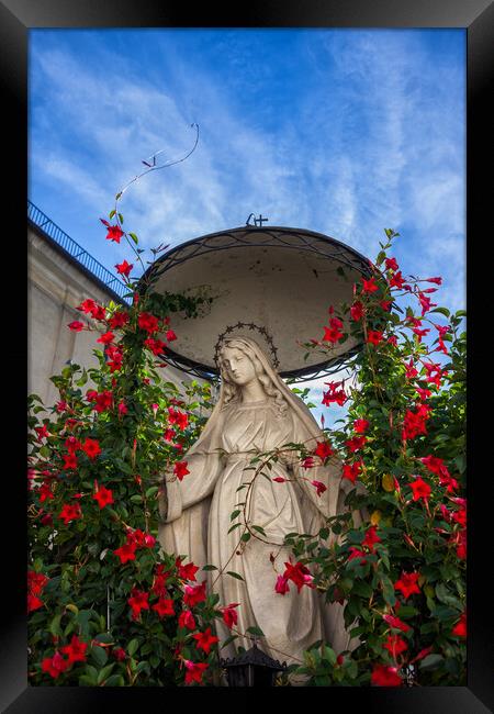 Tranquil Statue of Our Lady in Krakow Framed Print by Artur Bogacki