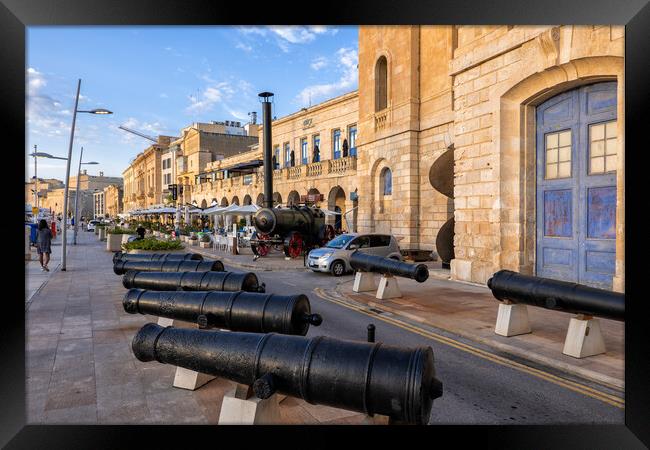 Cannons In Birgu Waterfront In Malta Framed Print by Artur Bogacki