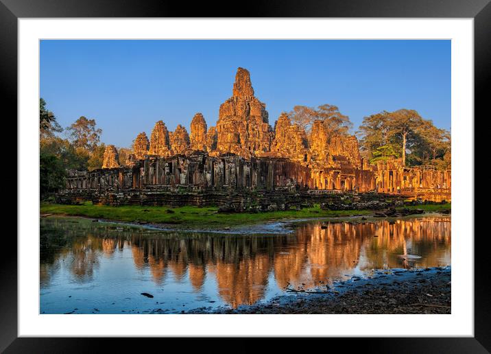 Bayon Temple At Sunset In Cambodia Framed Mounted Print by Artur Bogacki