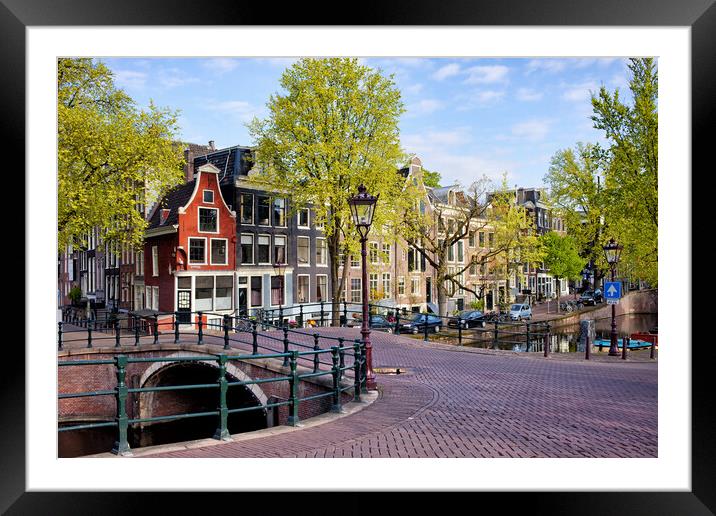 City of Amsterdam in Holland Framed Mounted Print by Artur Bogacki