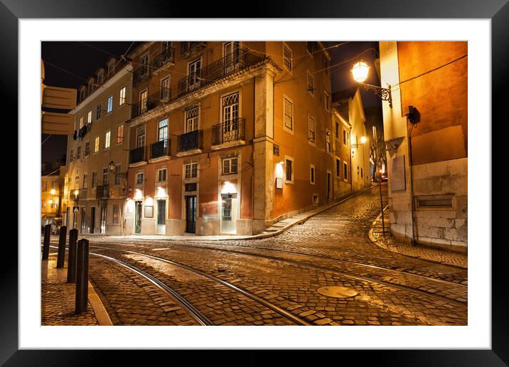 Lisbon Streets at Night in Portugal Framed Mounted Print by Artur Bogacki