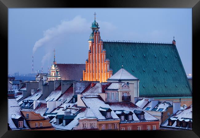 Old Town of Warsaw Snowy Roofs in Winter Framed Print by Artur Bogacki