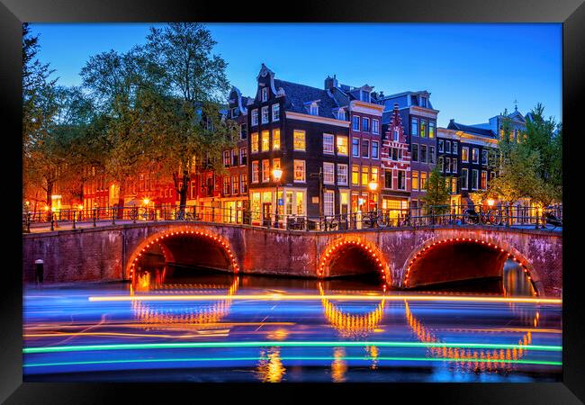 Evening in City of Amsterdam Framed Print by Artur Bogacki