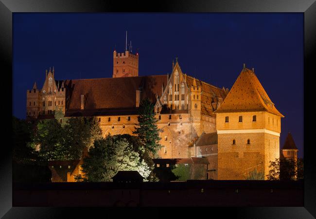 High Castle of the Malbork Castle at Night Framed Print by Artur Bogacki