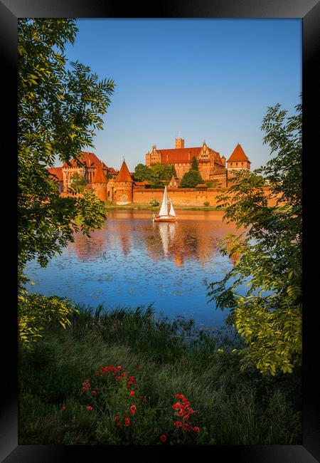 Malbork Castle at Sunset in Poland Framed Print by Artur Bogacki