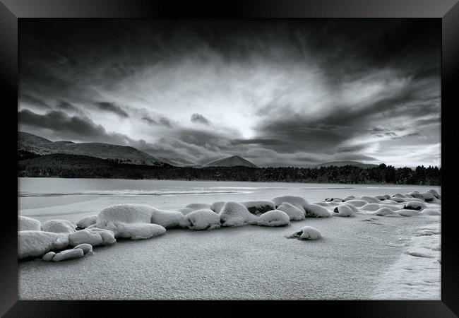 Dark Skies Over Loch Morlich Framed Print by Geoffrey Matthews