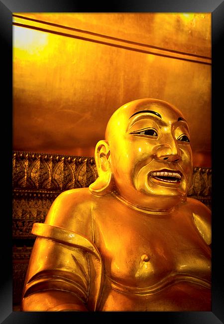 Lucky smiling Buddha of Wat Pho, Bangkok, Thailand Framed Print by Julian Bound