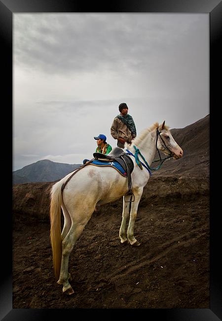 Horsemen of Bromo volcano, Indonesia Framed Print by Julian Bound