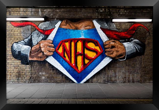 NHS Super Hero Framed Print by Wayne Howes