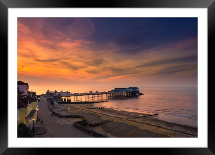 Cromer pier at sunset. Framed Mounted Print by Bill Allsopp