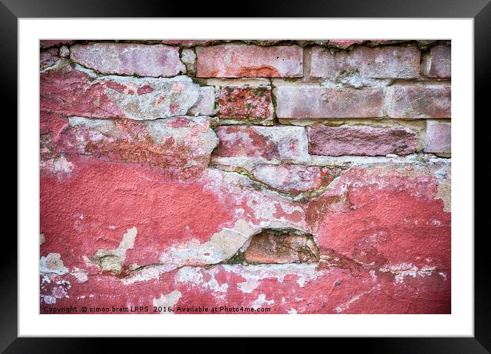 Grunge red wall with broken plaster close up Framed Mounted Print by Simon Bratt LRPS