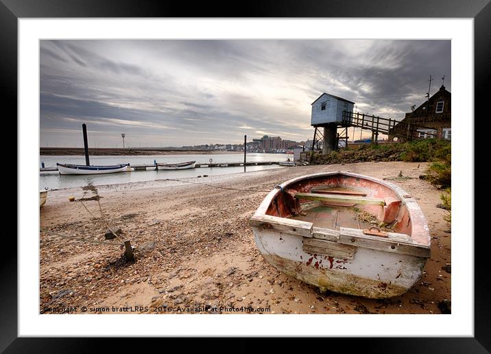 Old rowing boat and lookout tower on beach Framed Mounted Print by Simon Bratt LRPS