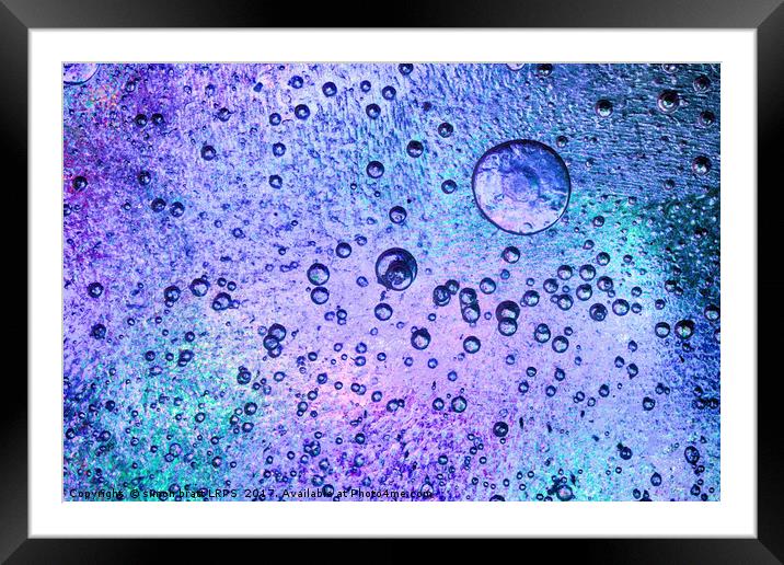 Frozen ice background with pink and blue colours Framed Mounted Print by Simon Bratt LRPS
