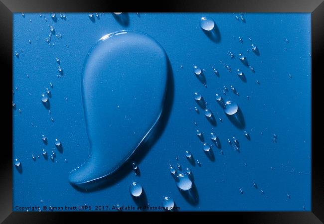 Large and small water droplets viewed from above Framed Print by Simon Bratt LRPS