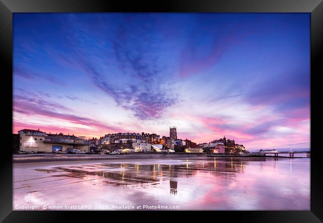 Cromer pier and town in Norfolk with pink sunset Framed Print by Simon Bratt LRPS