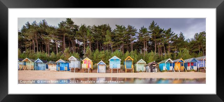 Beach hut row on the Norfolk coast Framed Mounted Print by Simon Bratt LRPS