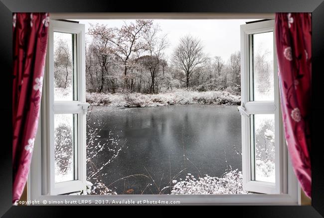 Beautiful frozen lake scene through an open window Framed Print by Simon Bratt LRPS