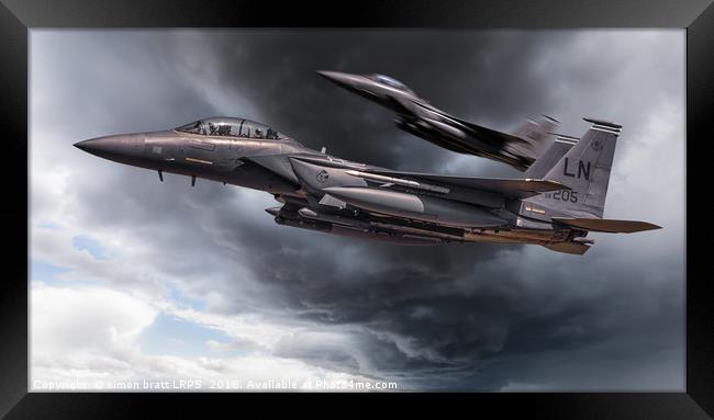 Two fighter jets close up in storm clouds Framed Print by Simon Bratt LRPS