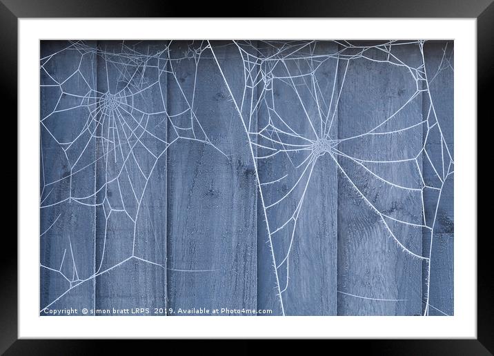 Spiders web on fence with winter ice Framed Mounted Print by Simon Bratt LRPS