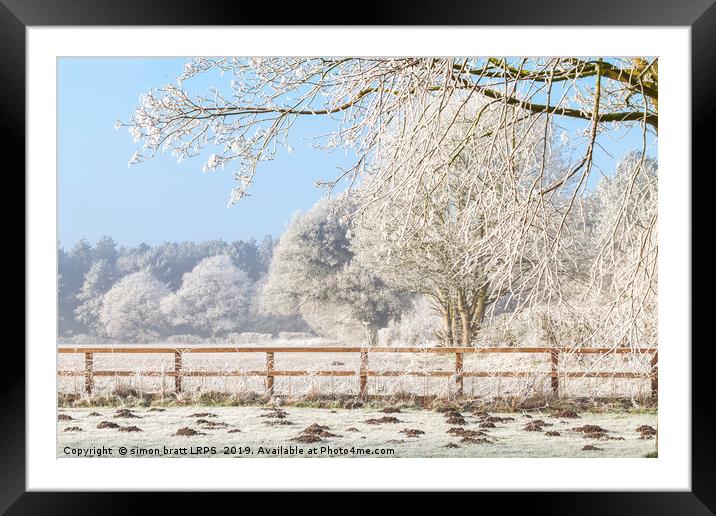 Winter scene with trees fence and mole hills Framed Mounted Print by Simon Bratt LRPS